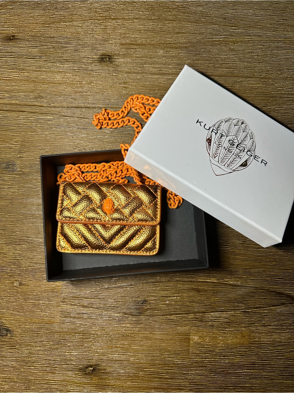 Kurt Geiger Metallic Orange Quilted Mini Crossbody. Card holder